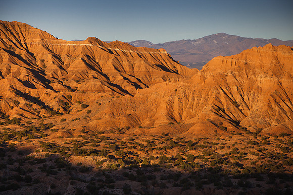 Chimayó Badlands and Jemez mountains at Sunrise